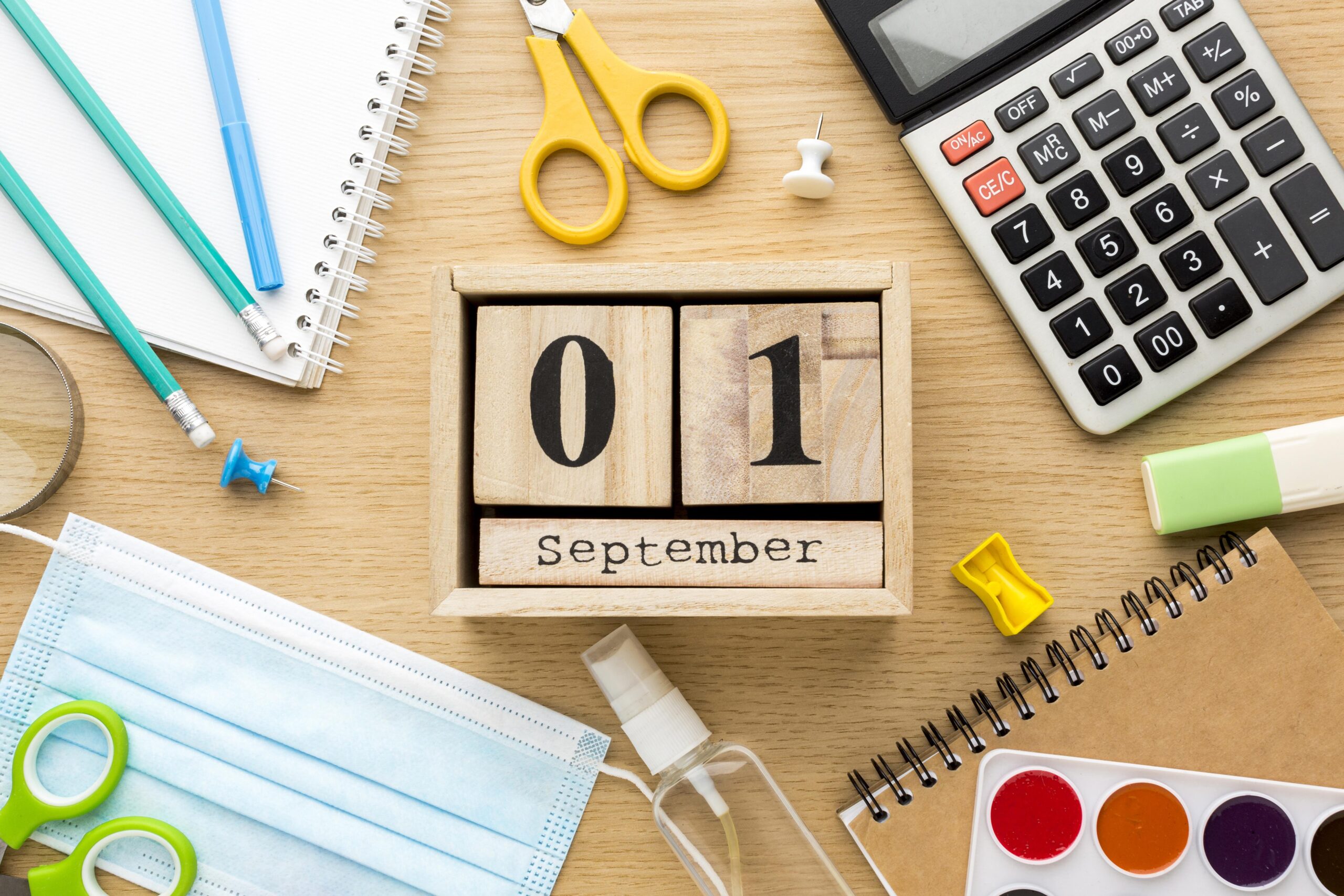 top-view-back-school-essentials-with-calendar-medical-mask